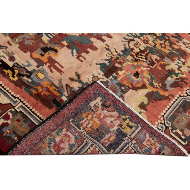 Beautiful Vintage Lilihan hand-knotted wool rug showcasing a rose field. This Persian rug features multicolored accents in...