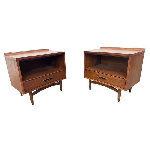 Elevate your bedroom with this stunning pair of Mid-Century Modern Broyhill Sculptra walnut nightstands, beautifully...