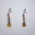 Pair of italian wall sconces dating from the 1950s, characterized by a slender geometric structure and a refined...