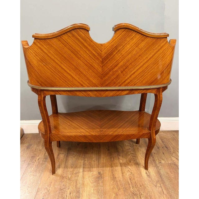 French two tiered console table - or etagere - in the louis xv style hand crafted from kingwood the ormolu fixtures are...