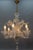 - Italian Venetian Murano clear glass and gold dust floral six-light chandelier from the circa 1950s. - This majestic...