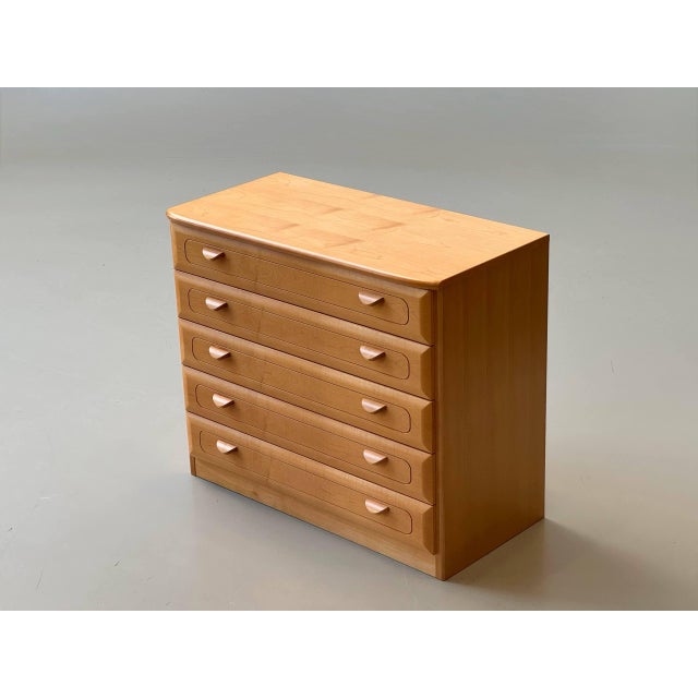 High-quality chest of drawers with five spacious drawers in warm cherry wood. The piece is distinguished by its softly...