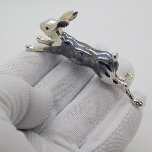 Vintage miniature sculpture full of instant movement, depicting a running hare, handmade in Italy between the 1980s and...