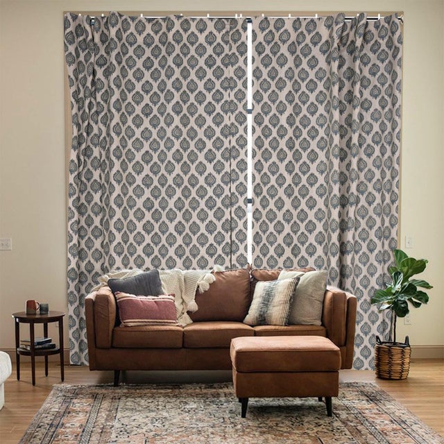 Add a touch of artisan charm to your home with this hand block printed viscose linen ring curtain. Crafted from...