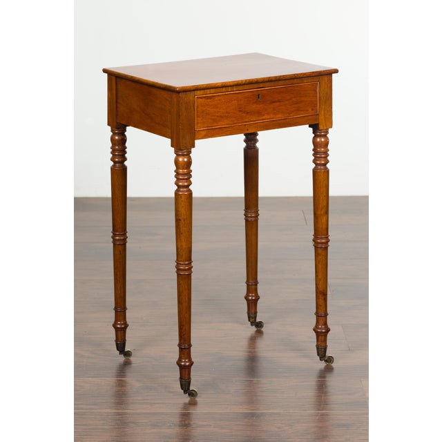 English 1820s Walnut Side Table with Single Drawer, Turned Legs and Casters For Sale In Atlanta - Image 6 of 12