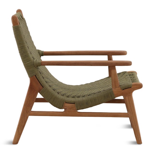 This accent lounge chair brings a fresh and organic feel to indoor and outdoor living with its sculptural teak wood frame...