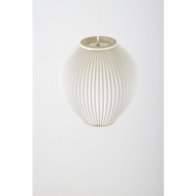 Danish pearl shade hanging lamp designed by Lars Schiøler in the 1960s. This lamp is of a slightly larger size than usual...