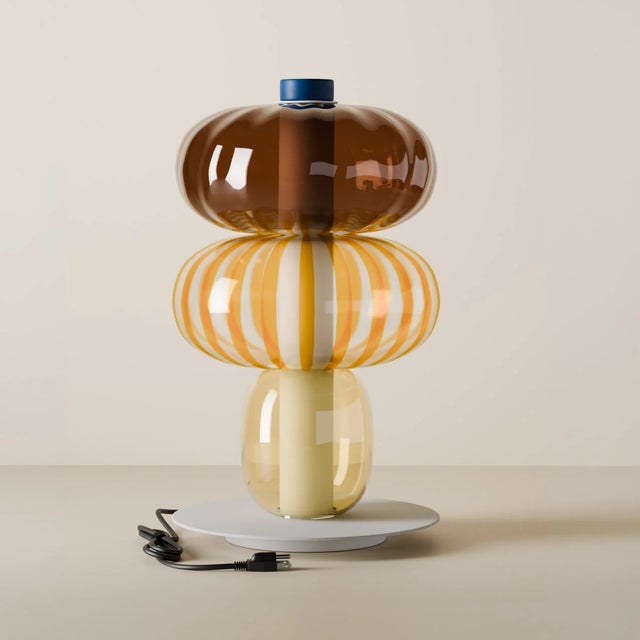 Handcrafted on the island of Murano, the Playground table lamp lets light become the true protagonist. Glass is not just a...