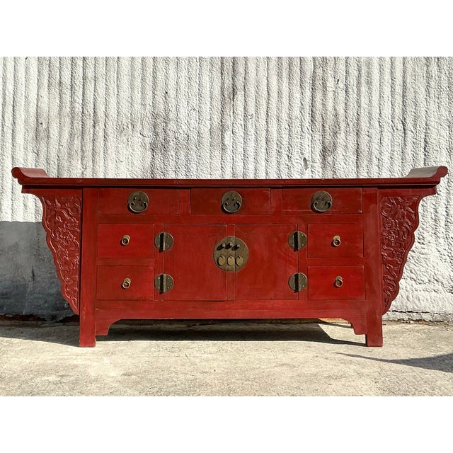 The Vintage Asian Reclaimed Wood Pagoda Credenza is a stunning example of craftsmanship inspired by traditional Asian...