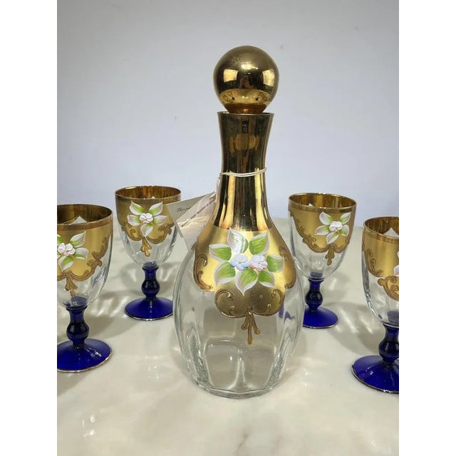 Bottle set and six glasses in hand -painted Murano glass in 24kt gold, Italy, 70s Wedding gift from my grandparents, the...