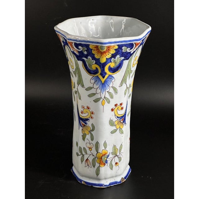 Elegant faience vase produced by the Fourmaintraux manufactory in Desvres, France, in the 19th century. This piece...