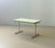 This original kelko folding table impresses with its ingenious folding mechanism and clean, functional design. With just a...