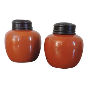 19th Century Chinese Porcelain Vase Jars in Coral Red / Orange Glaze with Carved Wood Lids - A Pair
