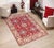 Enhance your home with this exquisite hand-knotted Kazak rug, crafted from fine hand-spun wool and dyed with all-natural...