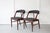 A pair of rare Danish carver chairs, attributed to Hans Hovmand Olsen. The chairs have solid teak frames and have been...