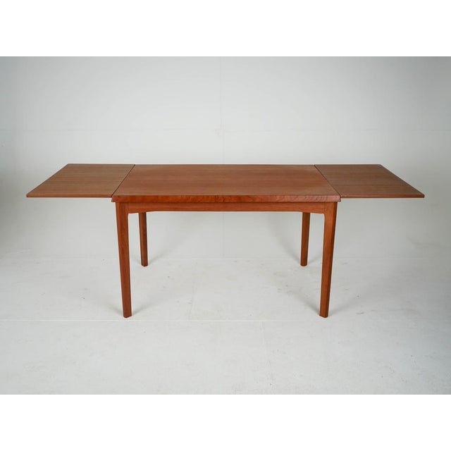 Vintage Extendable Dining Table in Teak, 1960s, in Very Good conditions. Designed 1960 to 1969