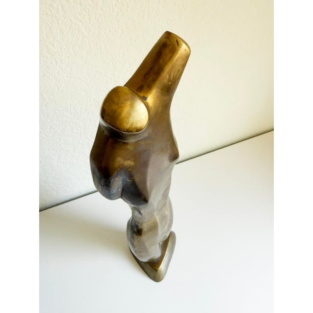 A 24" high brass nude sculpture attributed to Emiel de Block (born 1941), a Belgian Postwar and Contemporary listed...