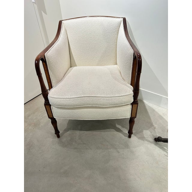 Elegant and especially luxurious antique club chair having glossy mahogany frame with inlay satinwood and handsome turned...