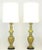 Pair of expertly crafted gilt plaster baluster style table lamps with applied patina. Excellent build quality as they...