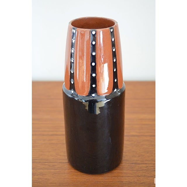 A beautiful Art Nouveau majolica vase by Josef Strnact from Turn-Teplitz, Austria. The design of this vase is striking for...