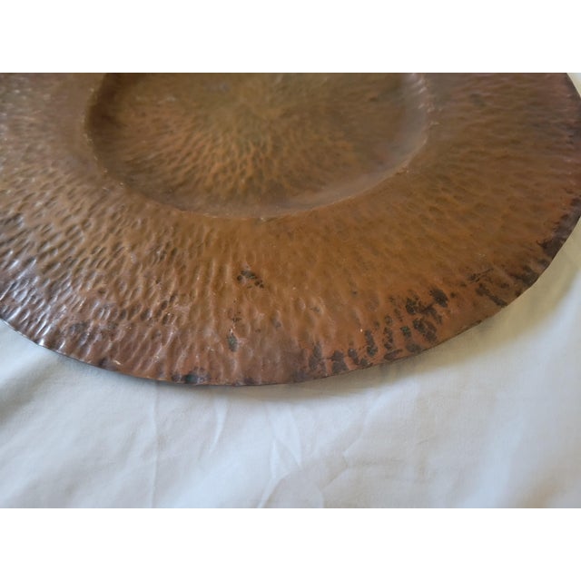 Beautiful Hammered Arts and Crafts Platter or Charger. Features a Flame or Swirl design on copper. Slight indent in the...