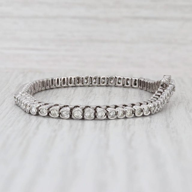 Gemstone Information: - Natural Diamonds - Total Carats - 2.50ctw Cut - Round Brilliant Color - G - M Clarity - I1 - I2...