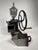 Beautiful antique German flywheel coffee grind (13 kg). Excellent object of furniture and collectibles. This piece has an...