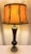 Illuminate your space with this stunning late twentieth century contemporary faux tortoise shell table lamp, a perfect...