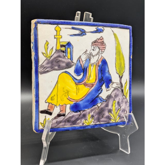 Traveling Man Treasures is selling this antique Persian ceramic tile crafted in the distinctive Qajar Dynasty style, which...
