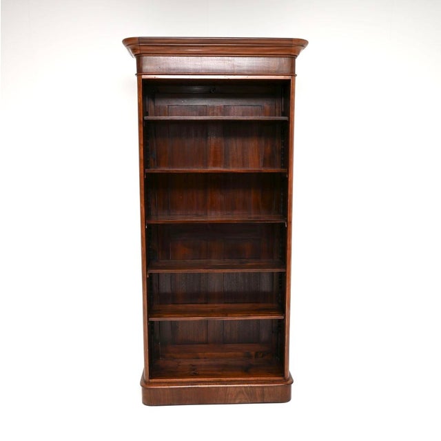 A superb antique Victorian open bookcase. This has been adapted from an original Victorian wardrobe, so most of it is made...