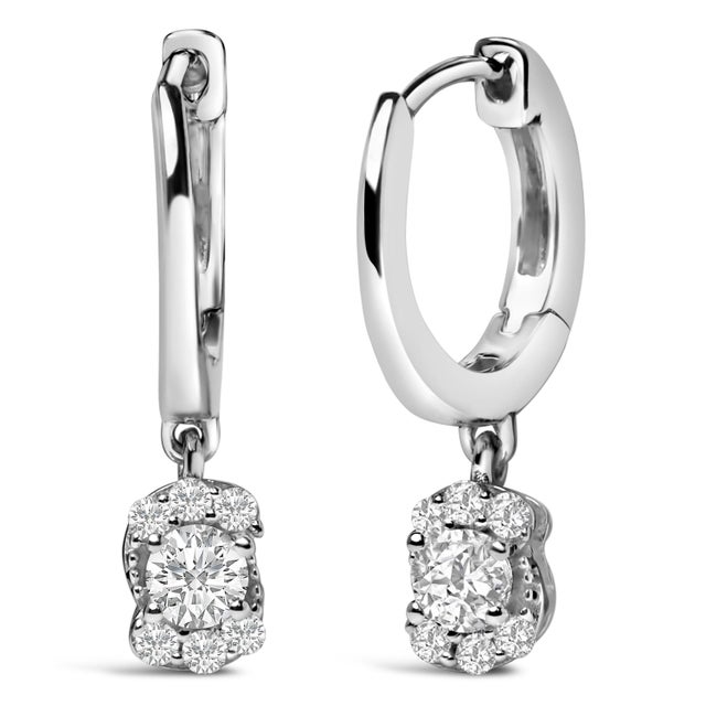 Elegance and ethereal charm encapsulate these Sterling Silver Floral Cluster Drop Earrings, each exquisitely adorned with...