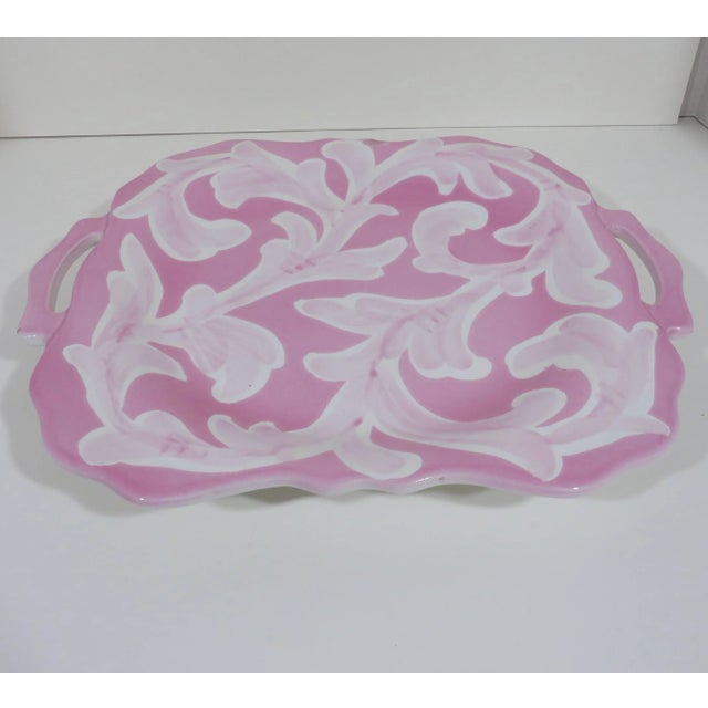 Hand-painted platter from Ciao Italya, in petal pink glaze with a white leaf motif. Good condition with light age wear; a...