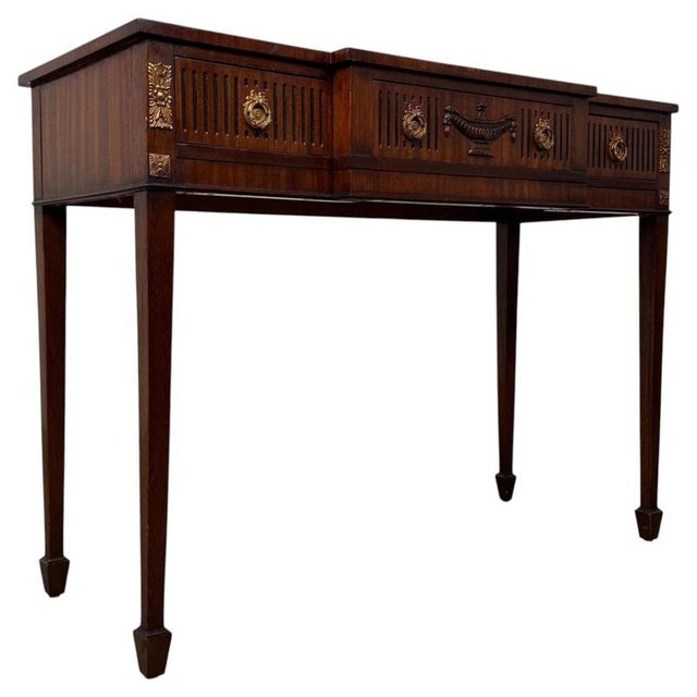 A beautifully proportioned 20th-century Adam style mahogany side table, combining refined neoclassical styling, elegant...