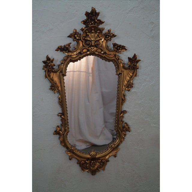 1950s Gilt Wood Rococo Hanging Wall Mirror. High quality, vintage, carved, gold painted, wood mirror. Signed, "Made In...