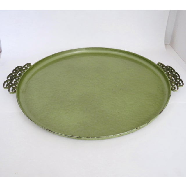 1950s American hammered metal tray finished in a yellow-green moire glaze enamel and decorated with attached ornate metal...