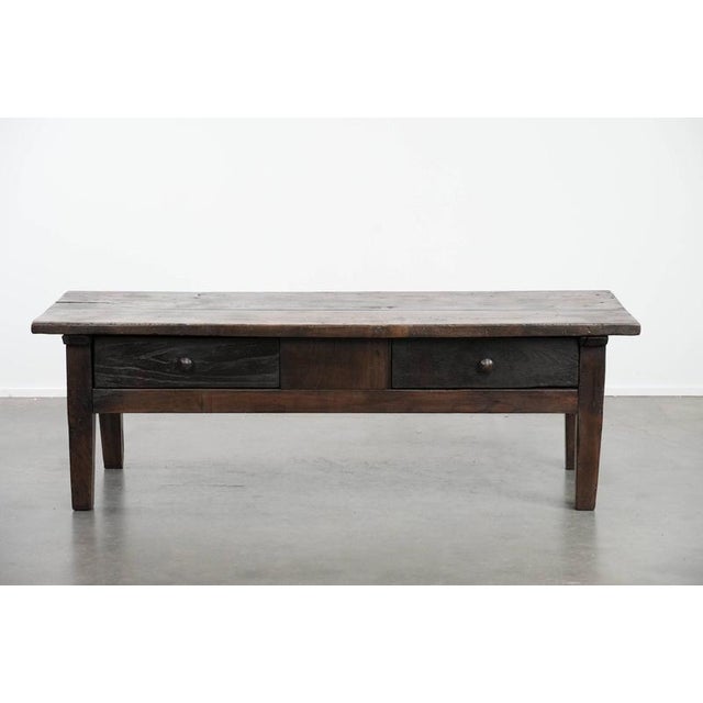 Beautiful antique 18th-century Southern European chestnut coffee table with two drawers and a beautiful patina. : This...