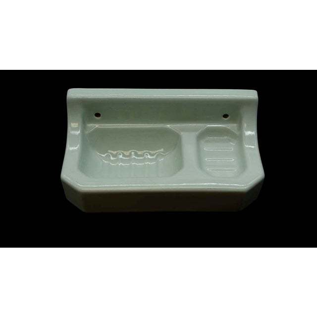 This vintage green porcelain surface mount wall soap dish adds a touch of retro elegance to your space while providing a...