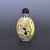 This is a charming vintage Chinese snuff bottle, crafted from a copper body with hand-painted enamel decoration. The...