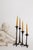Unusual artist's work of four organic candlesticks 39cm 35cm 30cm and 26cm high.