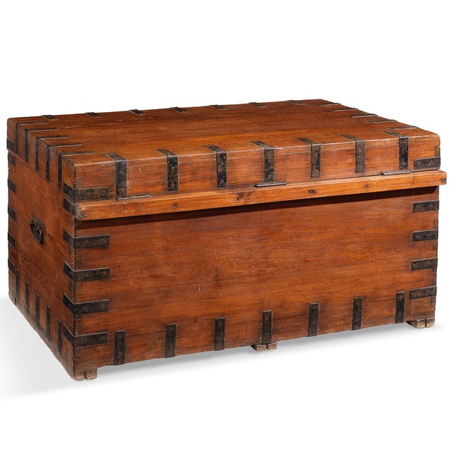 A handcrafted treasure from mid-20th century Rajasthan, this substantial storage chest showcases authentic Indian...