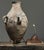 Vintage Monumental Tonaltepec Amphora Style Handled Clay Vessel with Custom Stand This large amphora style vessel...