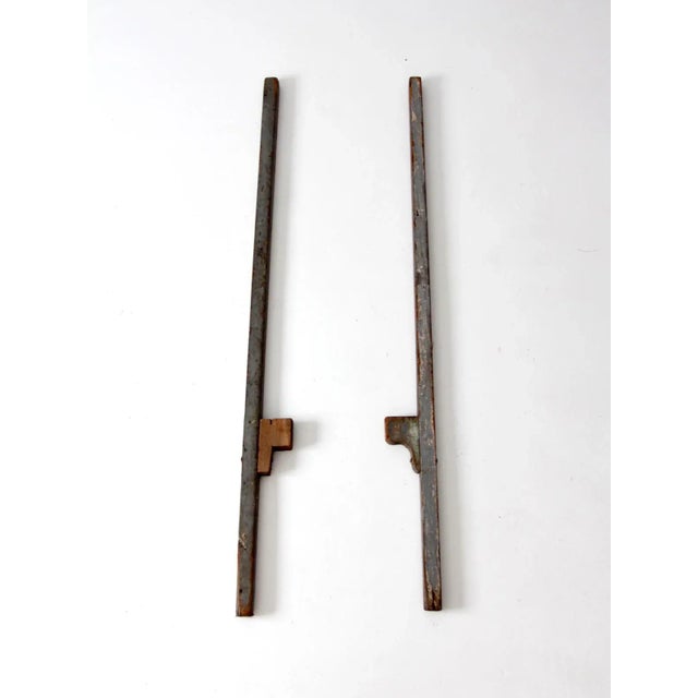 This is a pair of vintage wood stilts. The hand-built rustic wooden stilts have amazing character with beautiful wear to...