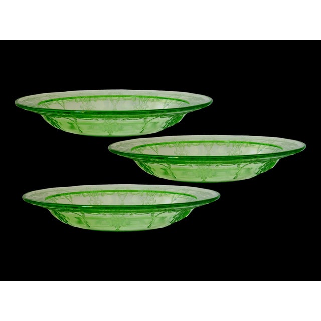 Set of three Anchor Hocking Cameo, also known as Ballerina, depression glass soup bowls in luminous green uranium glass....