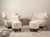 A magnificent and harmonious matched set of four pieces featuring two fully refurbished vintage retro armchairs...