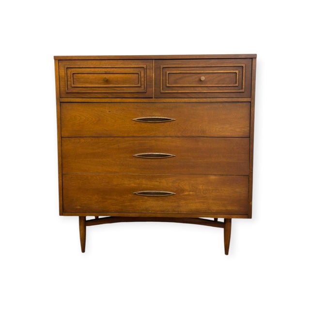 This authentic mid-century modern chest of drawers from Broyhill Premier's coveted Sculptra collection features rich...