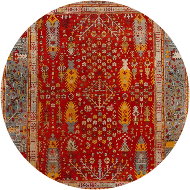 Beautiful antique Turkish Oushak rug, hand-knotted wool with a bright red field, blue frame, blue and yellow accents in an...