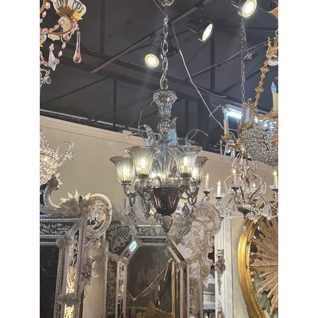 Petite scale modern Murano black glass chandelier. Circa 2000. The chandelier has been professionally rewired, comes with...