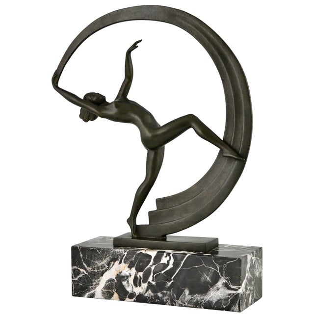 Art deco nude scarf dancer bacchanale by janle for max le verrier (1930) a captivating art deco sculpture of a nude scarf...