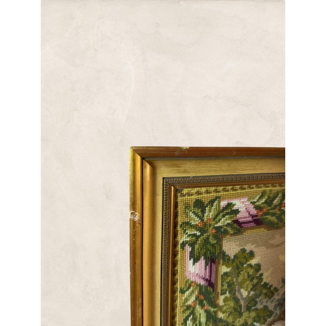 Stitched by hand and framed for the wall, this needlework tapestry recreates Carle Vanloo's "Reading Aloud" with a quiet...