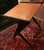 This Mid 20th Century French student desk is made of oak panels suspended within a dramatic black-painted Z-shaped frame...